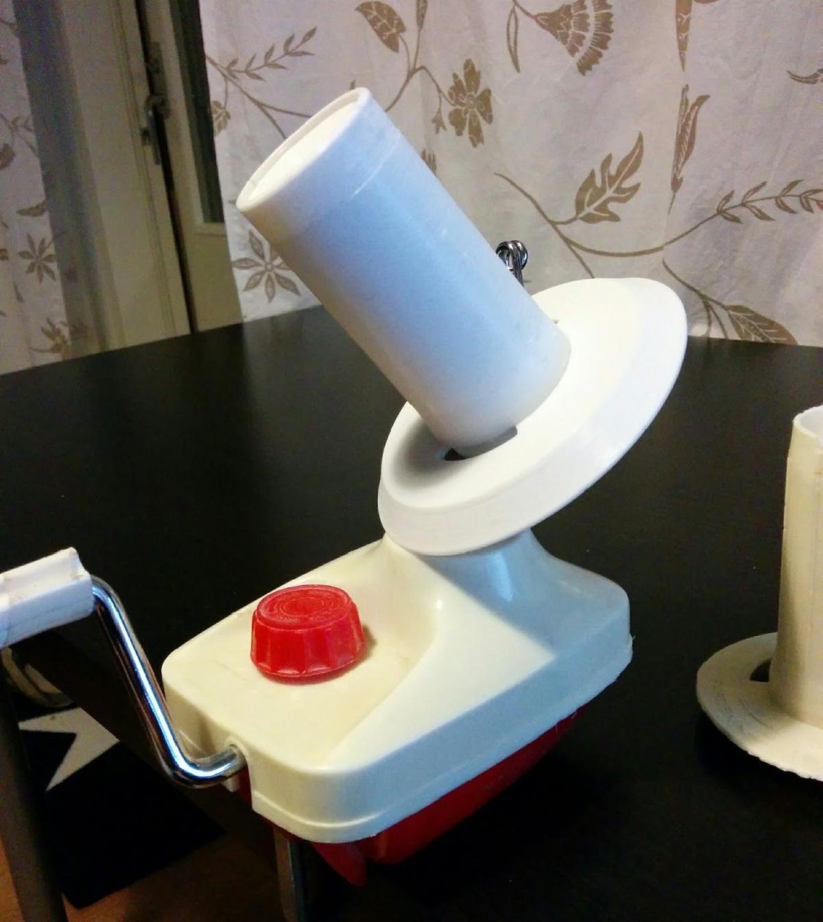 Fuso para enrolar la