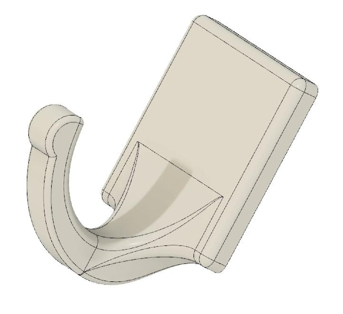 Ganchos de parede para roupas, fixados com fita adesiva em ambos os lados.