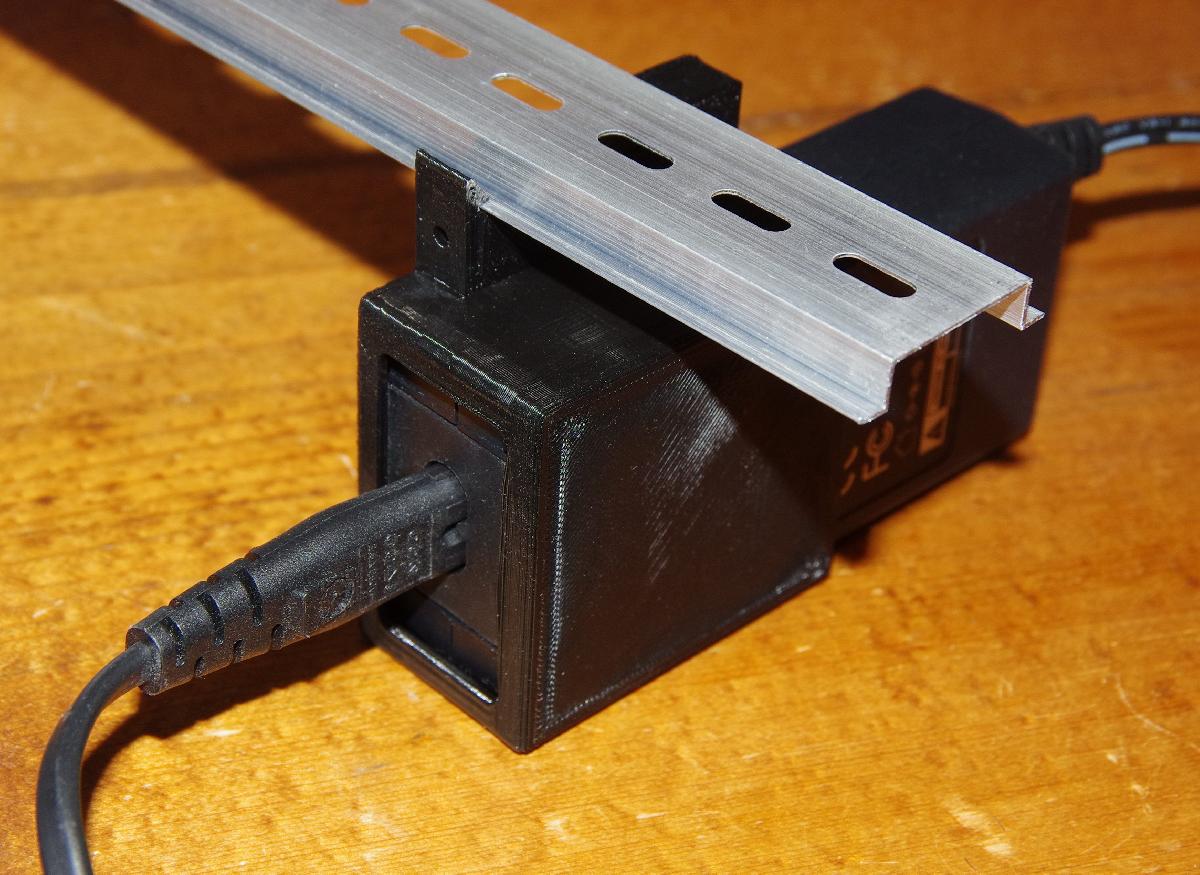 Suporte para montagem em trilho DIN para fonte de alimentacao DC