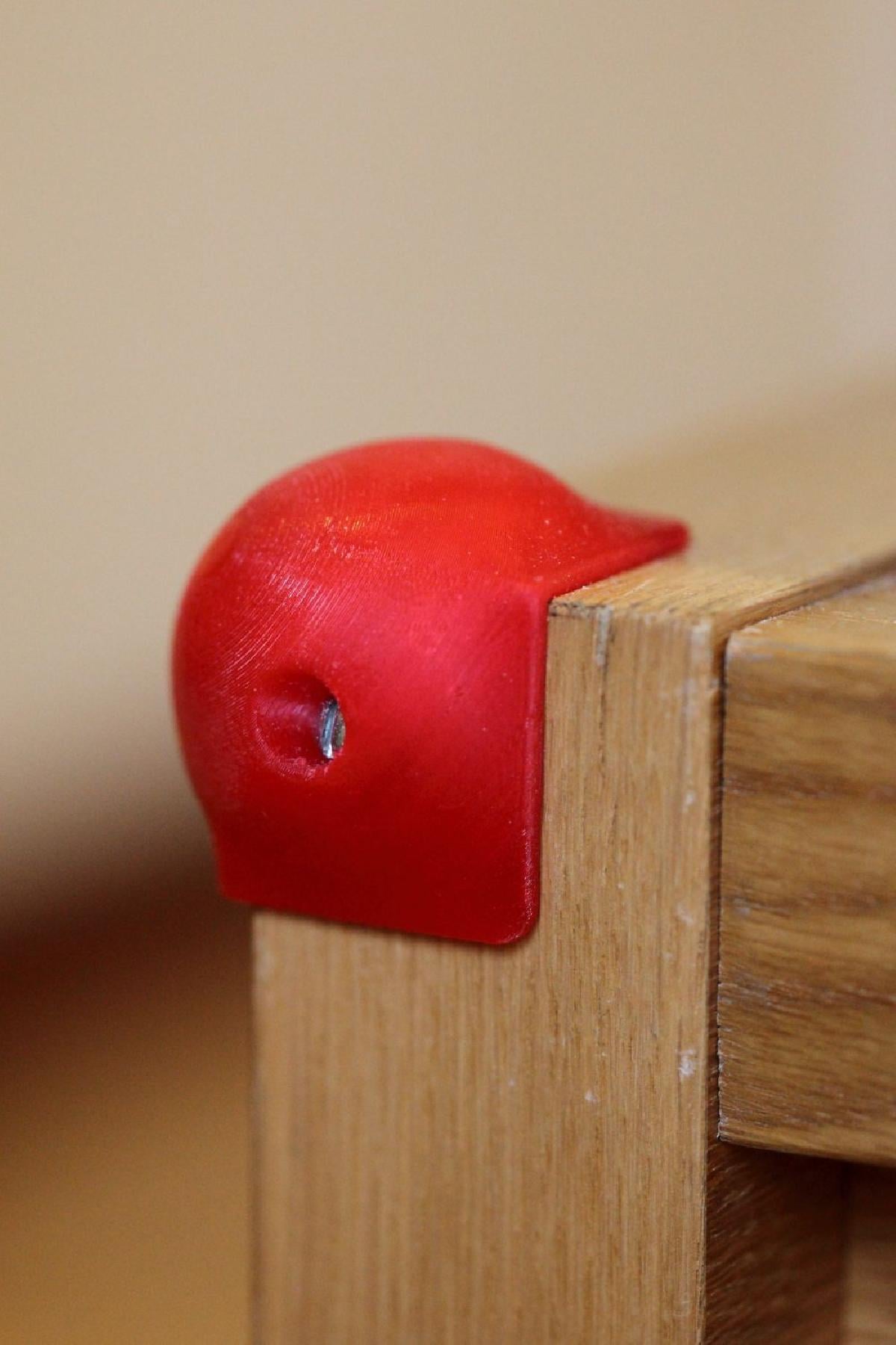 Protetor de canto para moveis