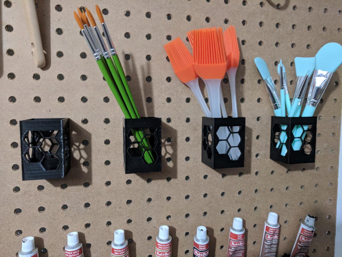 Suporte de ferramentas para painel perfurado