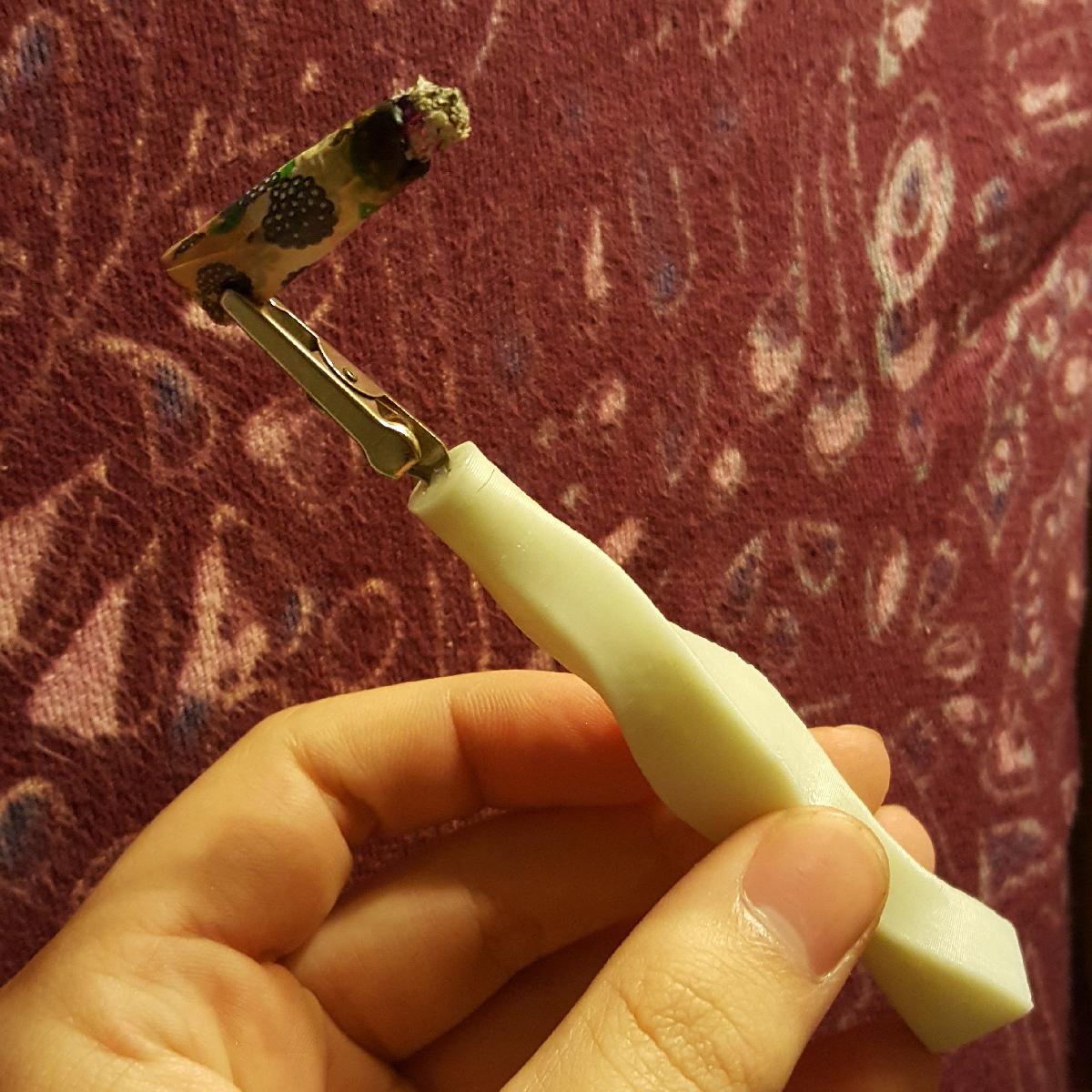 Clipe de base de cigarro