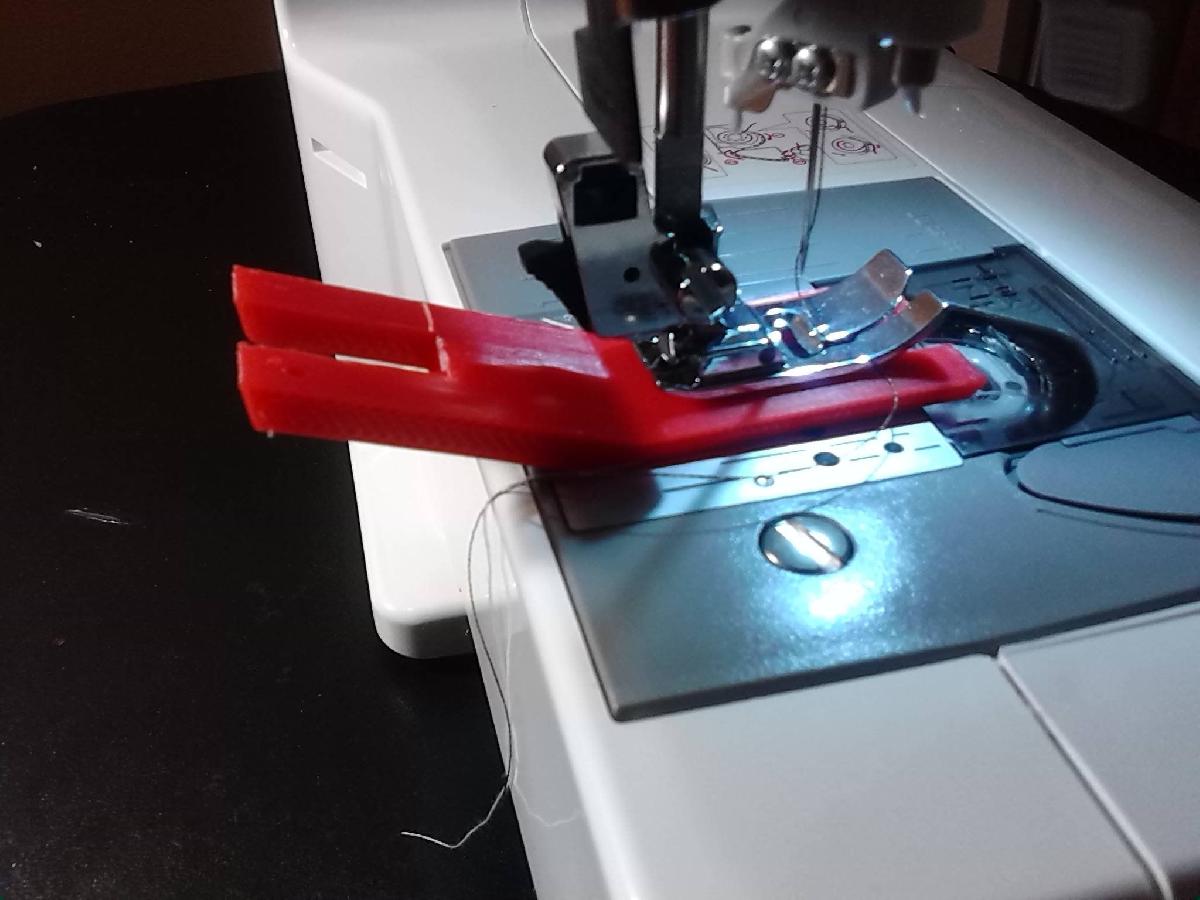 Placa de desvio para costura
