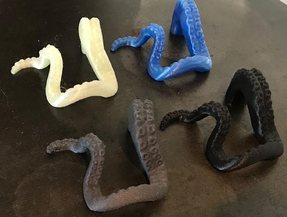 Suporte para telefone Polvo com bolsos para imas