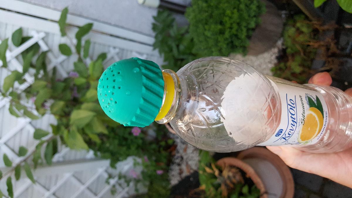 Tampa de rega de garrafa de refrigerante