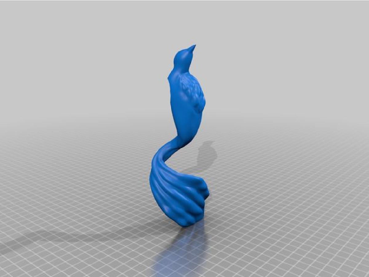 Topo de Arvore em Forma de Passaro