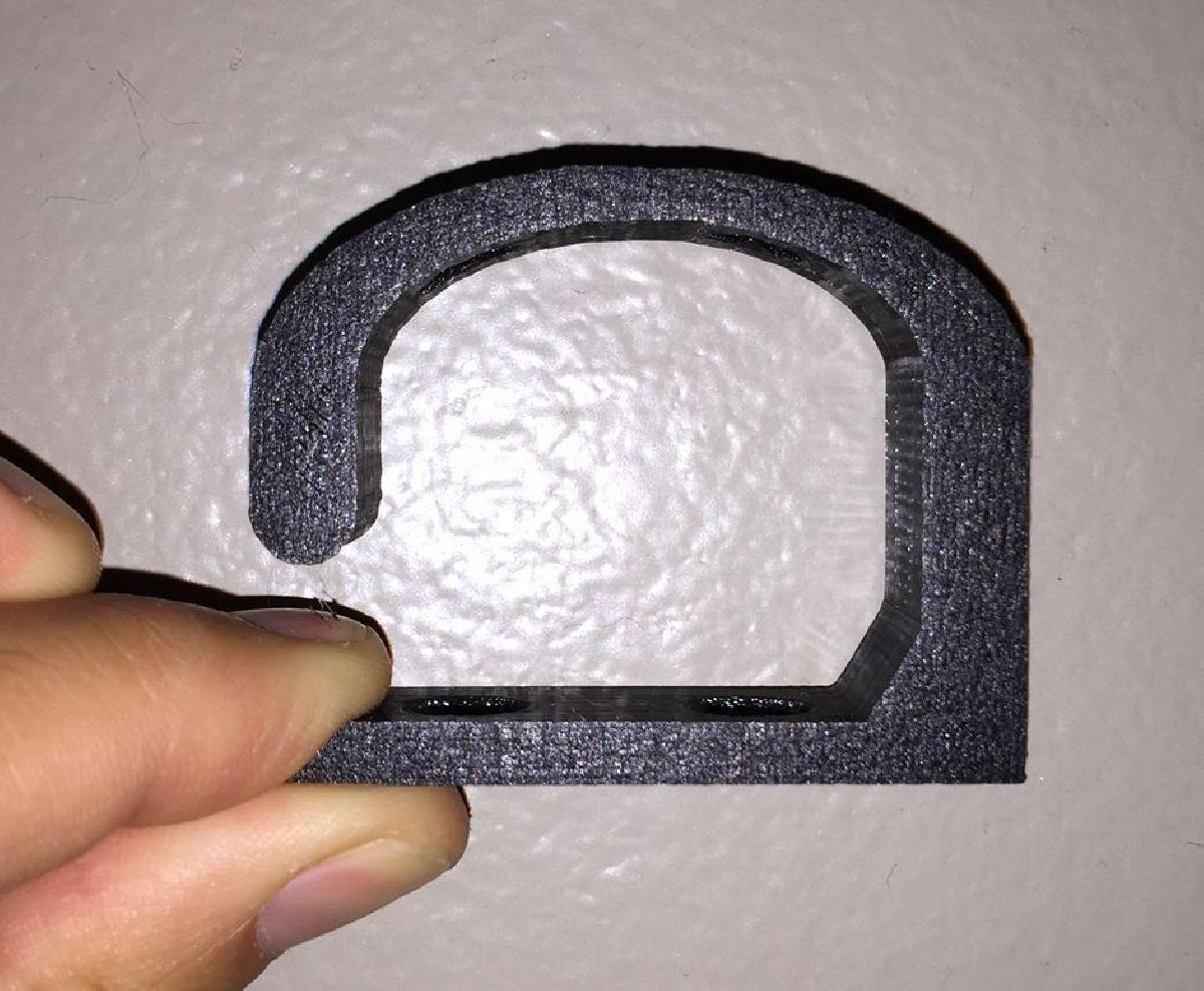 Gancho parabaixo da mesa