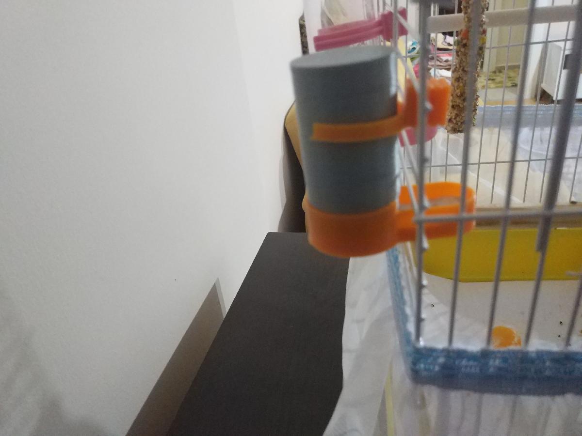 Comedouro de agua e areia para passaros