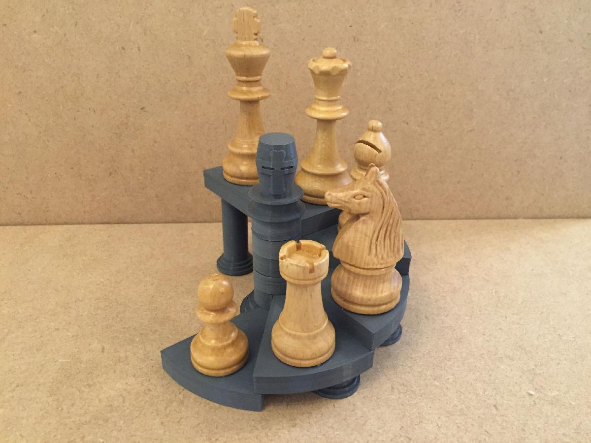 Suporte expositivo em espiral para conjuntos de xadrez