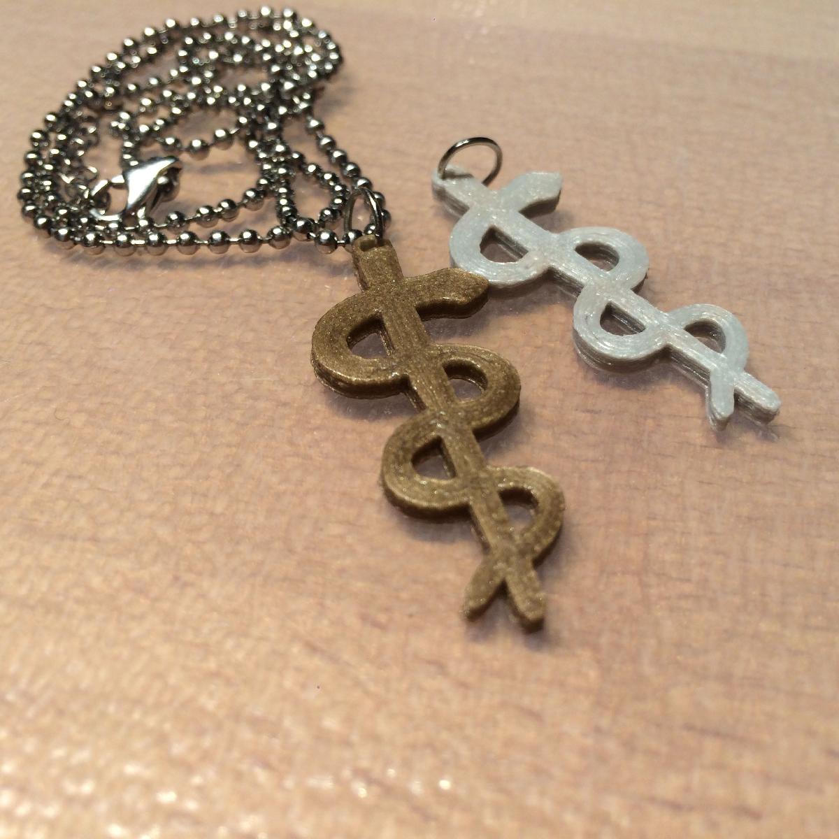 Pingente da Vara de Asclepio