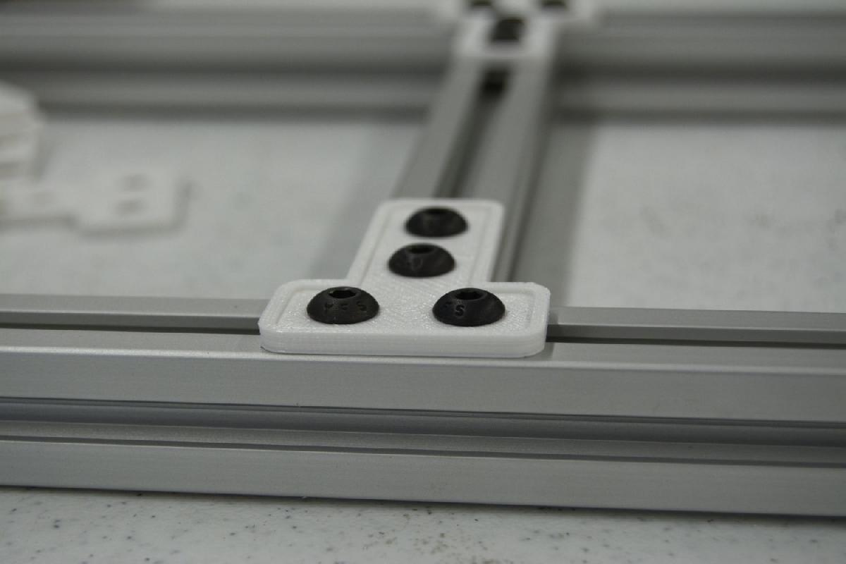 Suporte T personalizavel para trilhos em T