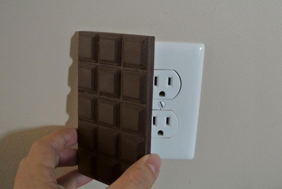 Tampa de saida de chocolate
