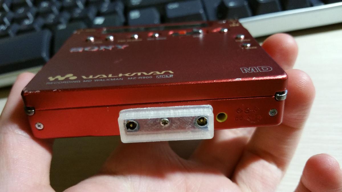 Adaptador de Bateria AA Externo para Minidisc