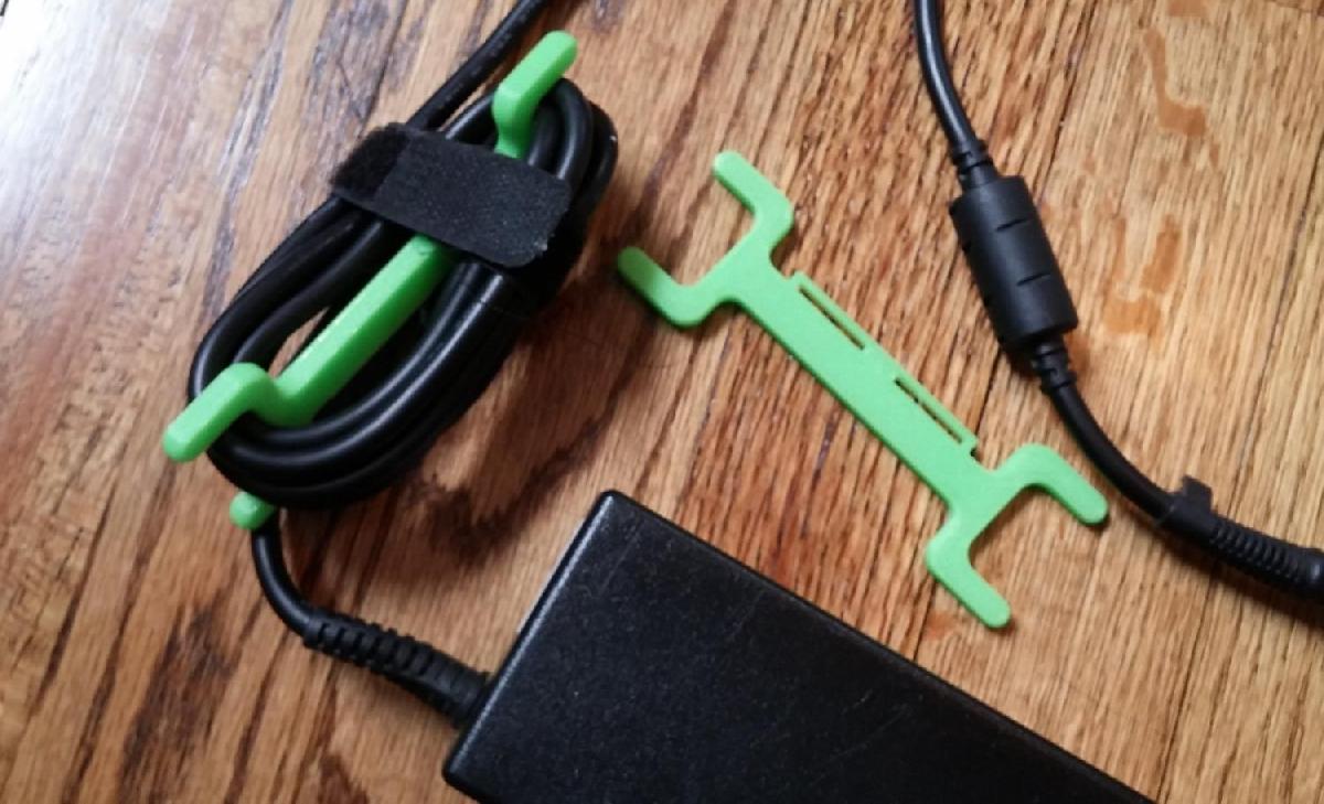 Embalagem simples de fio para cabos de alimentacao de laptop