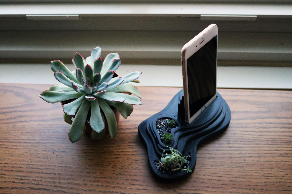 Suporte para telefone em paisagem em camadas