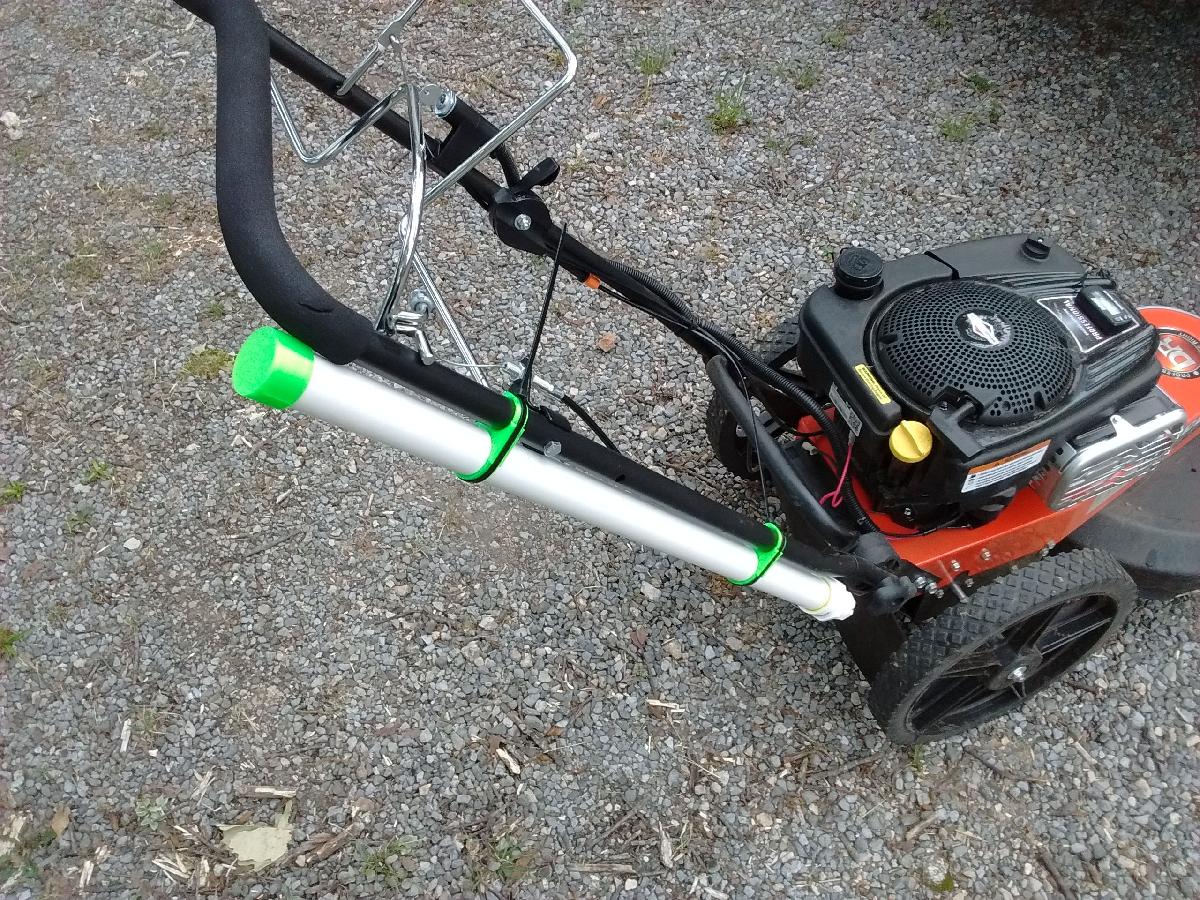 Tubo de armazenamento de linha para cortador de grama a pe