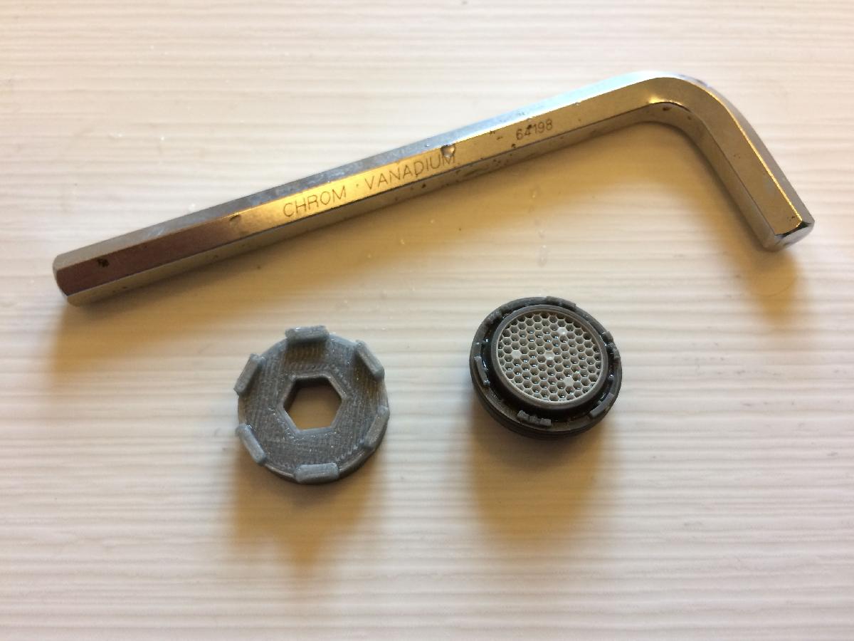 Chave para remocao do filtro de particulas da torneira