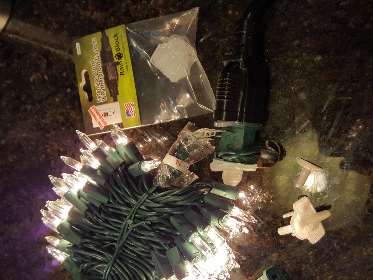 Plugue para luzes de Natal a prova dagua e extensoes de multiplos pinos