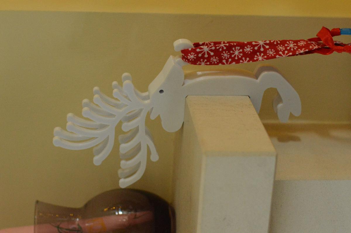 Suporte para meia de Natal com rena