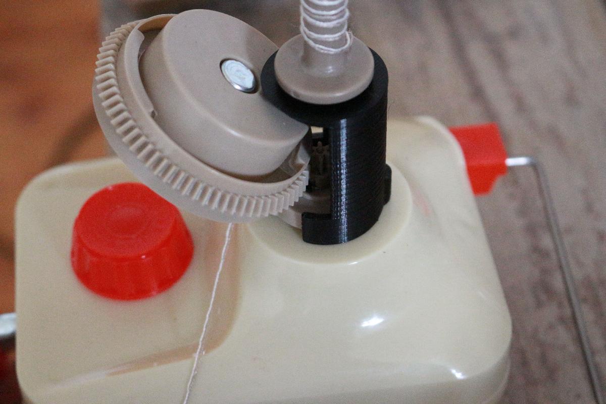 Adaptador de bobina para enrolador de fio