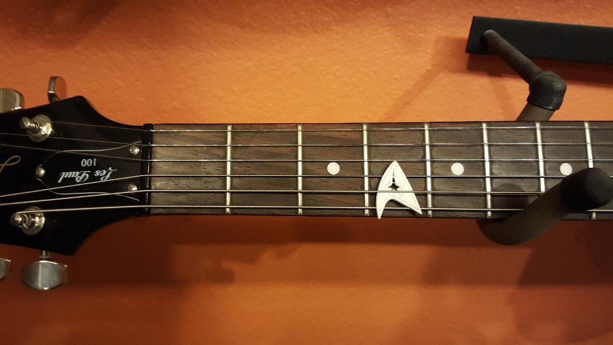 palheta de guitarra da frota estelar