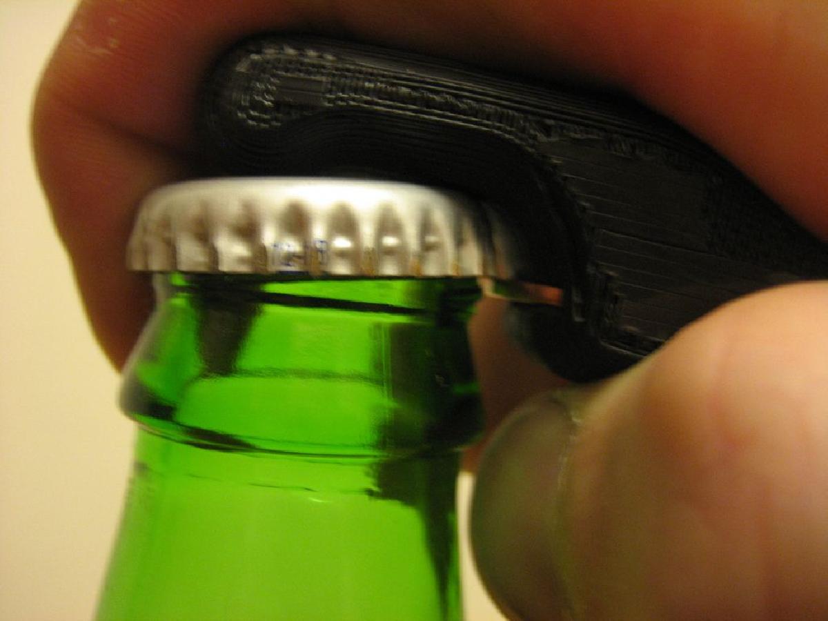 Abridor de Garrafas de Moeda