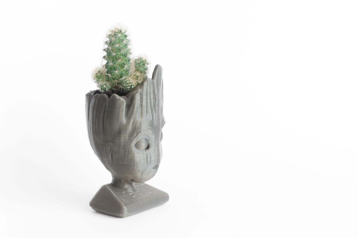 Plantador de cabeça groot do bebê