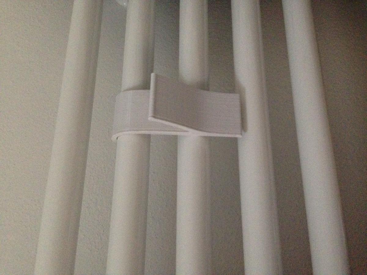 Suporte para toalhas de radiadores