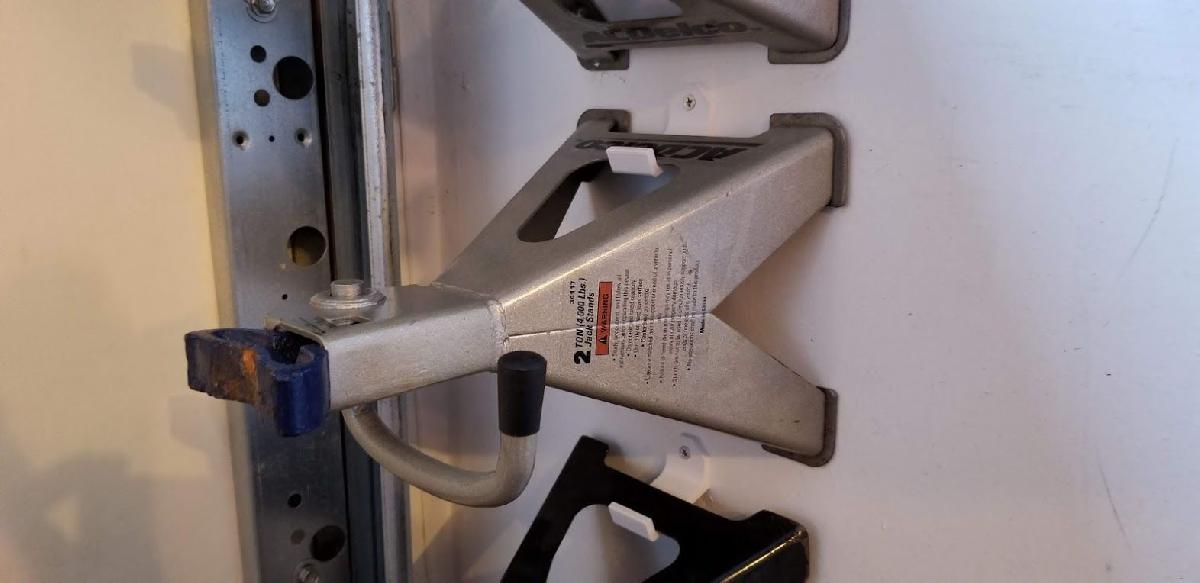 Gancho de parede para suporte de macaco