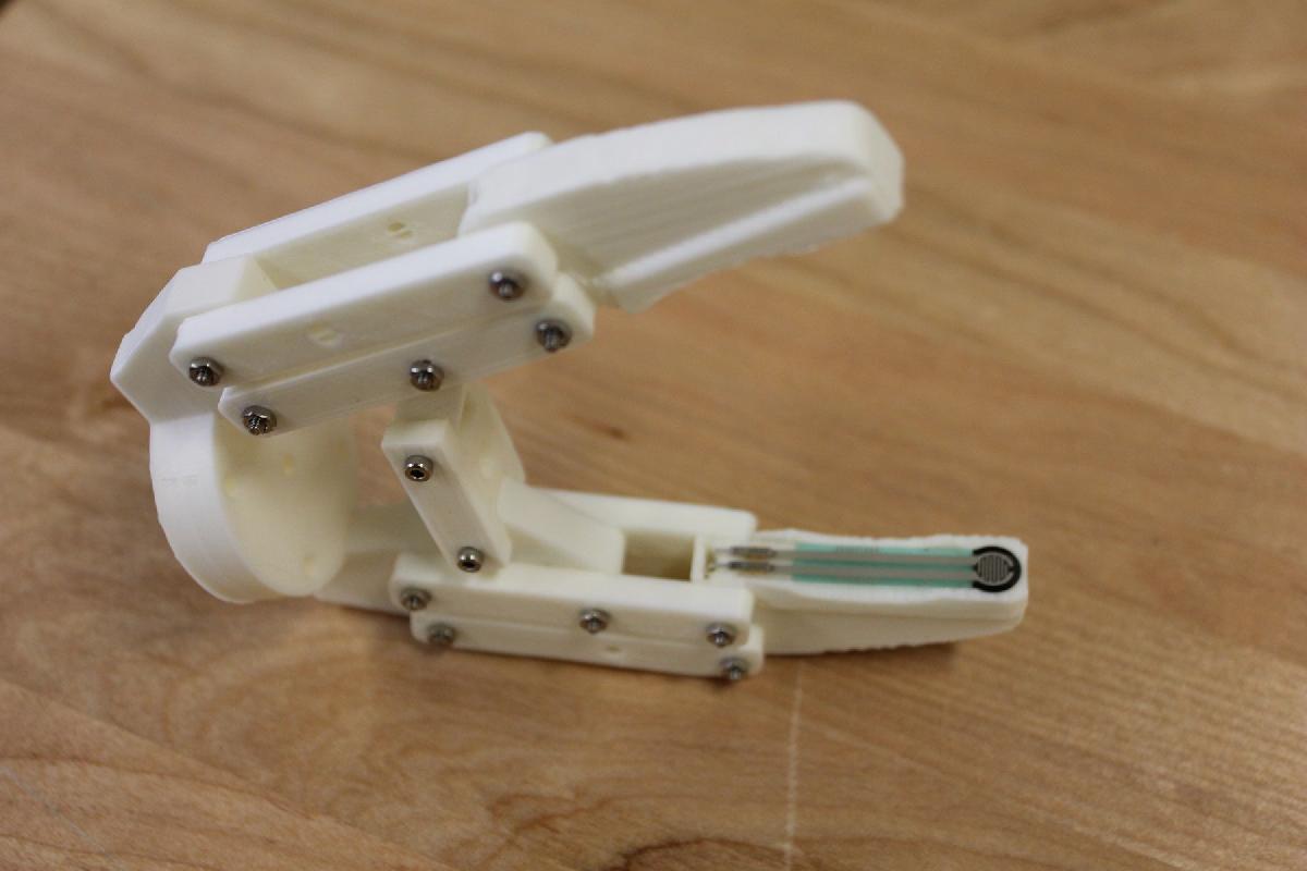 Garra sensivel a pressao