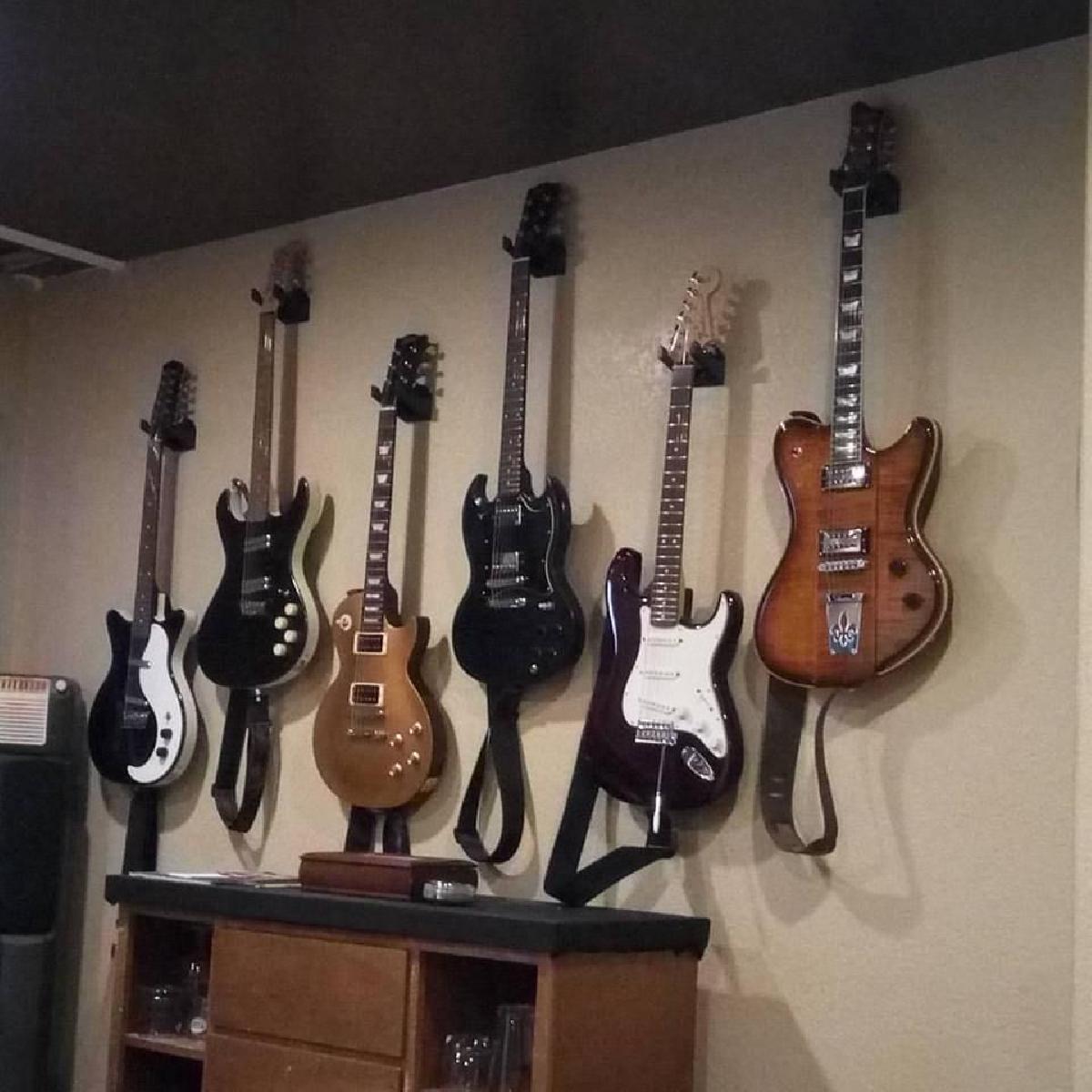 Suporte para guitarra na parede
