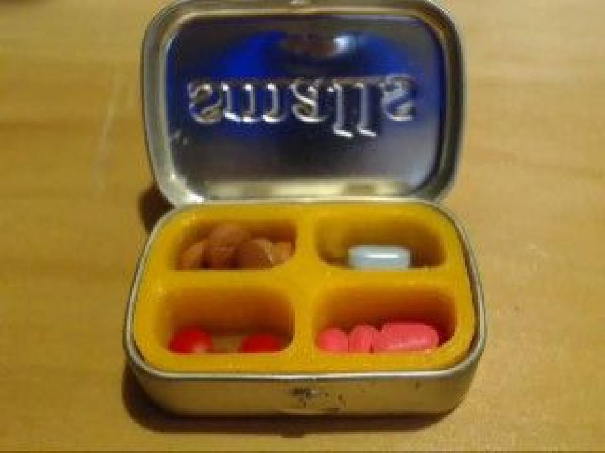 Divisoria da caixa de Altoid Smalls