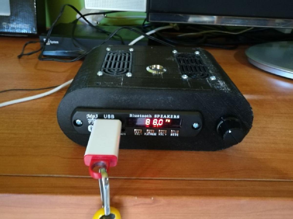 Reprodutor de MP3 e radio FM