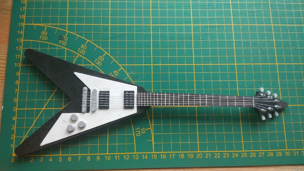 Modelo de mini guitarra Gibson Flying V