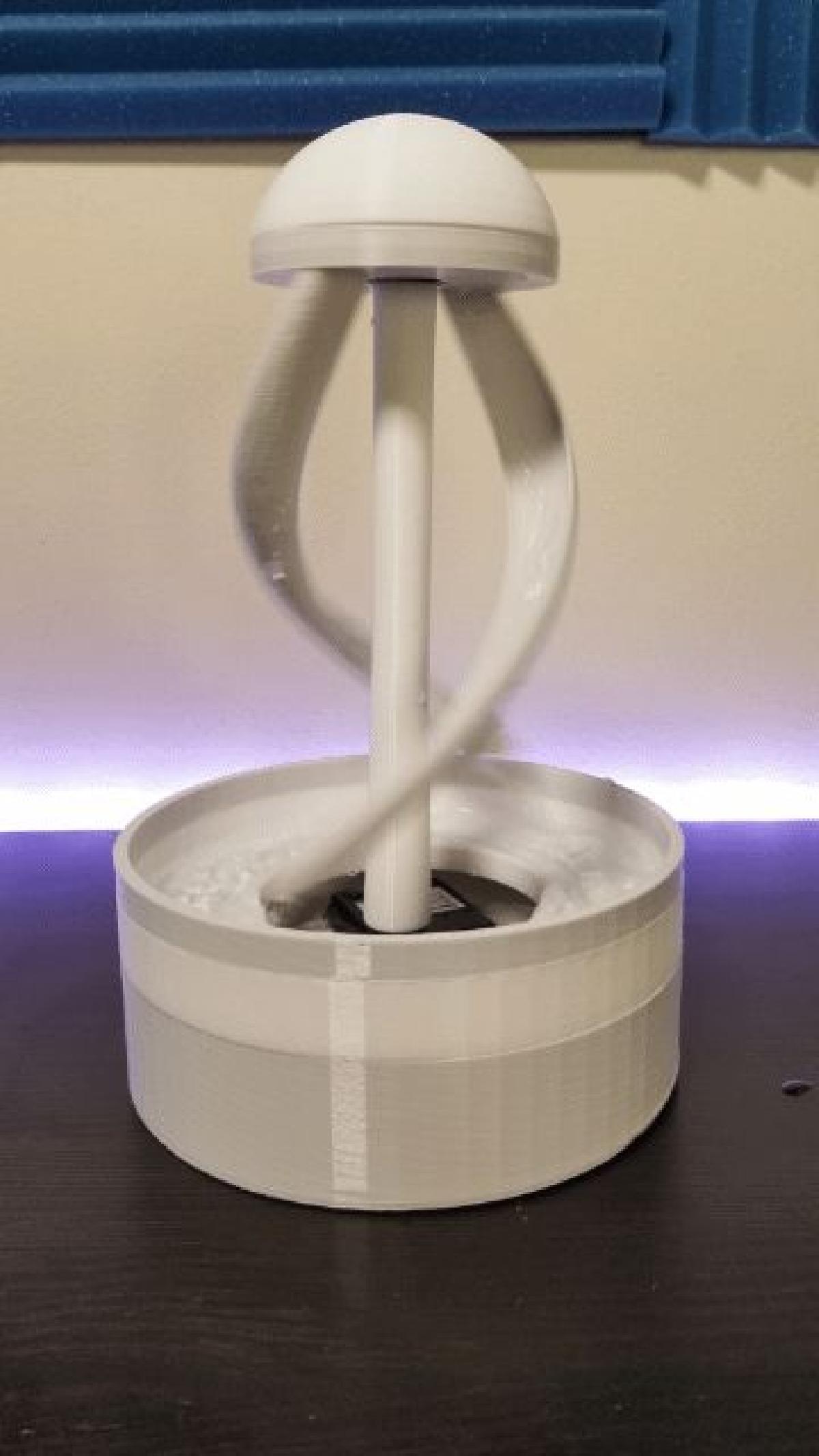 Fonte de agua giratoria para mesa