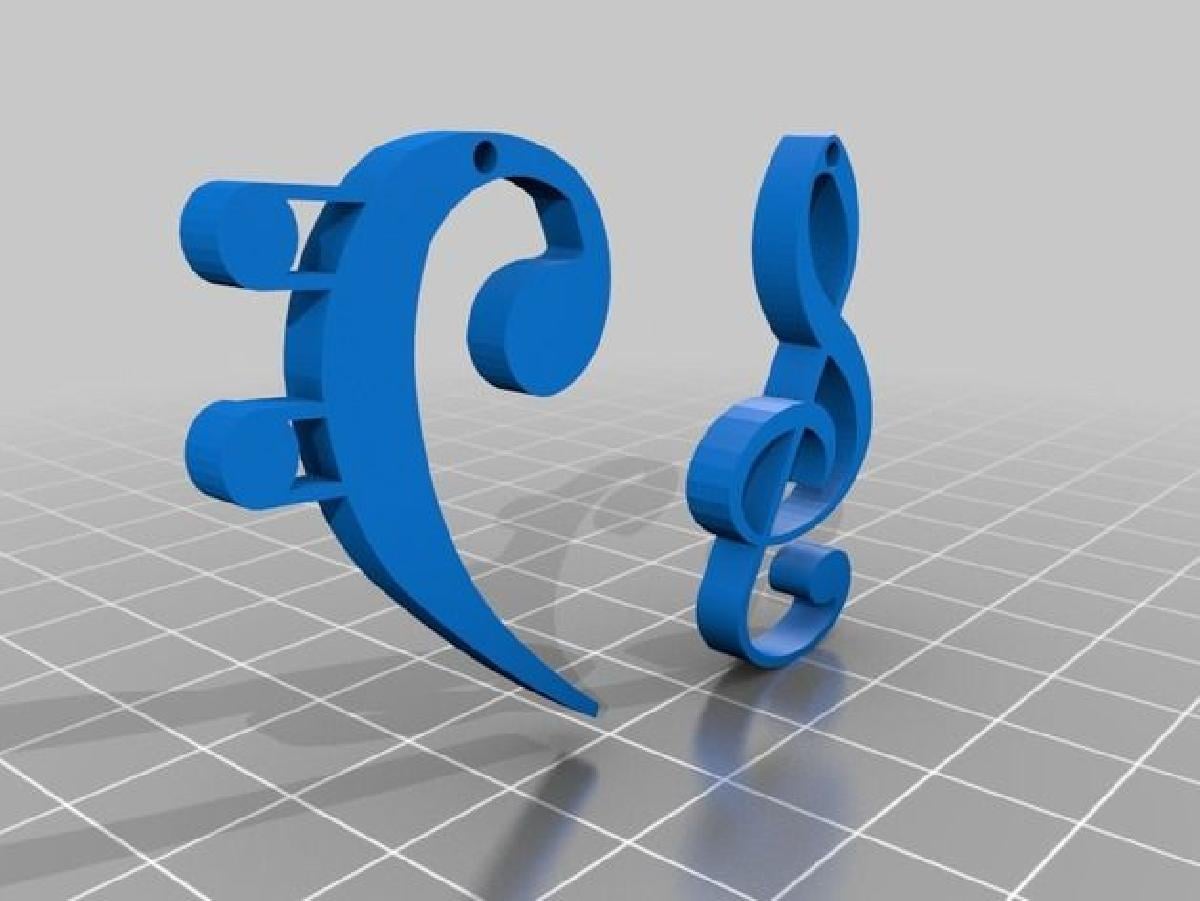 Brincos de clave de sol e clave de fa