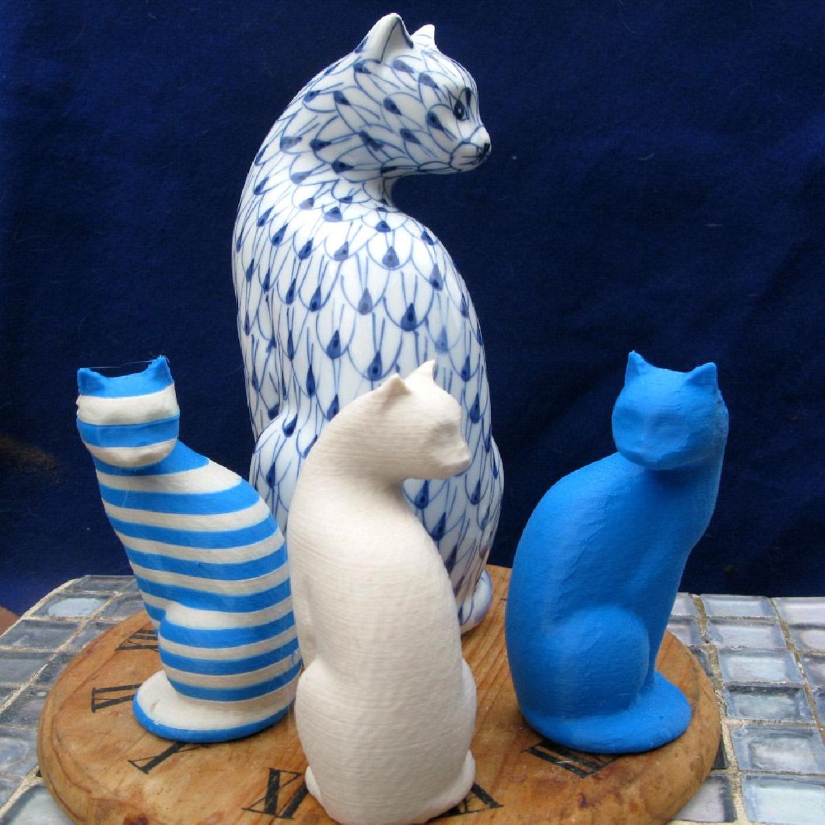 Gato Pintado a Mao