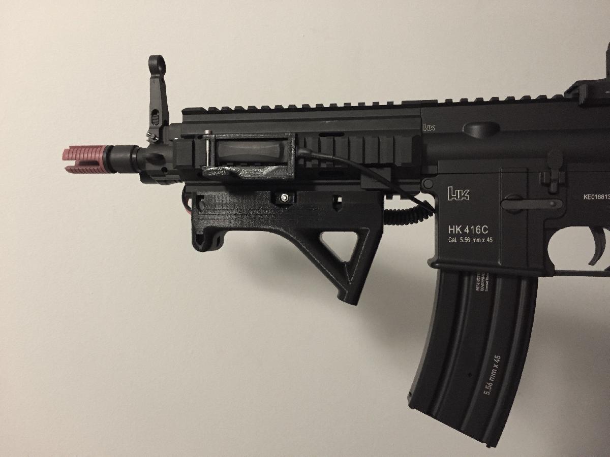 Grip angulado com compartimento para bateria