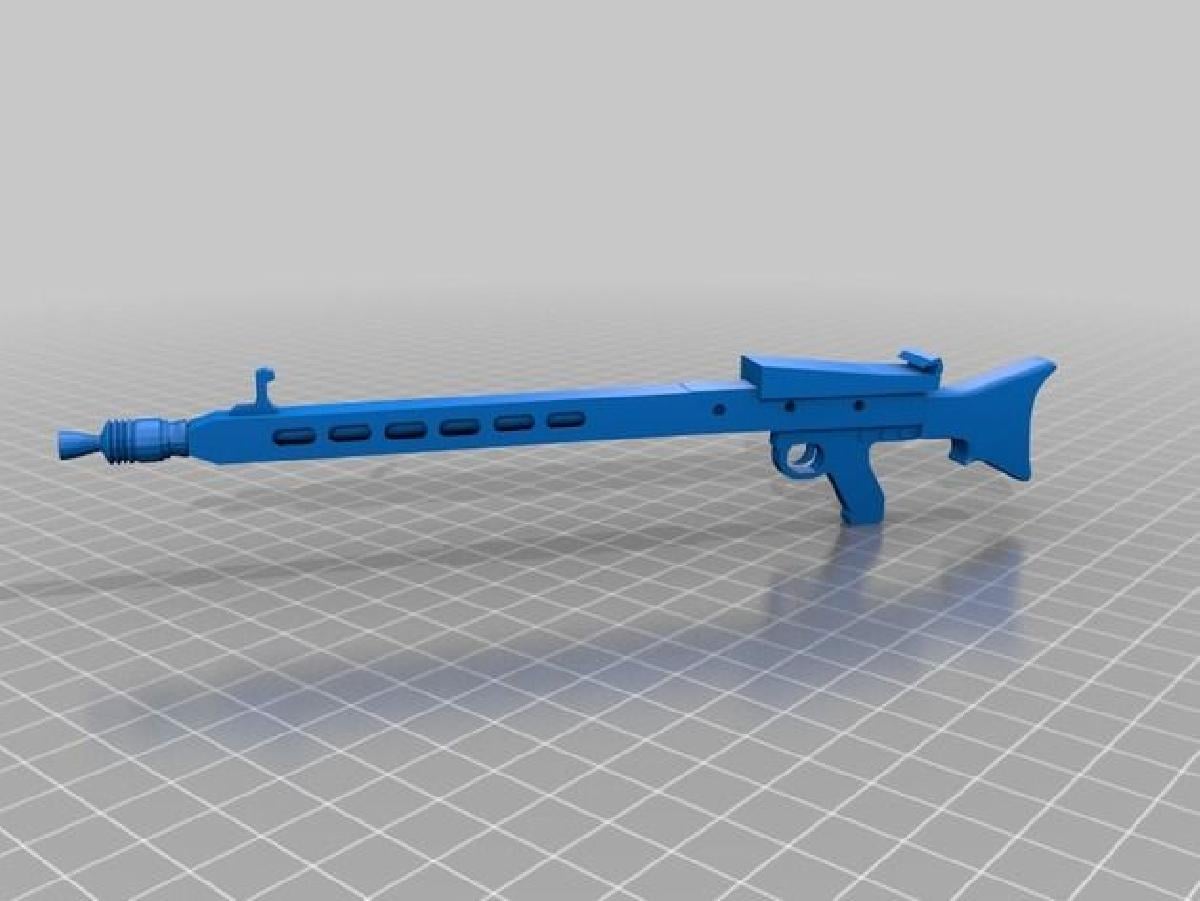 MG42 / Metralhadora 42, tambem conhecida como HITLERSAEGE   a noiva