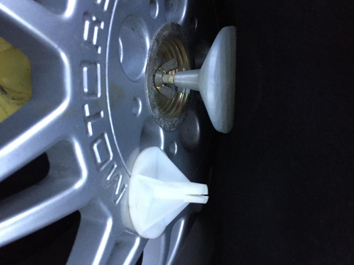 Suporte para estepe da bandeja de bagagem para veiculos BMW