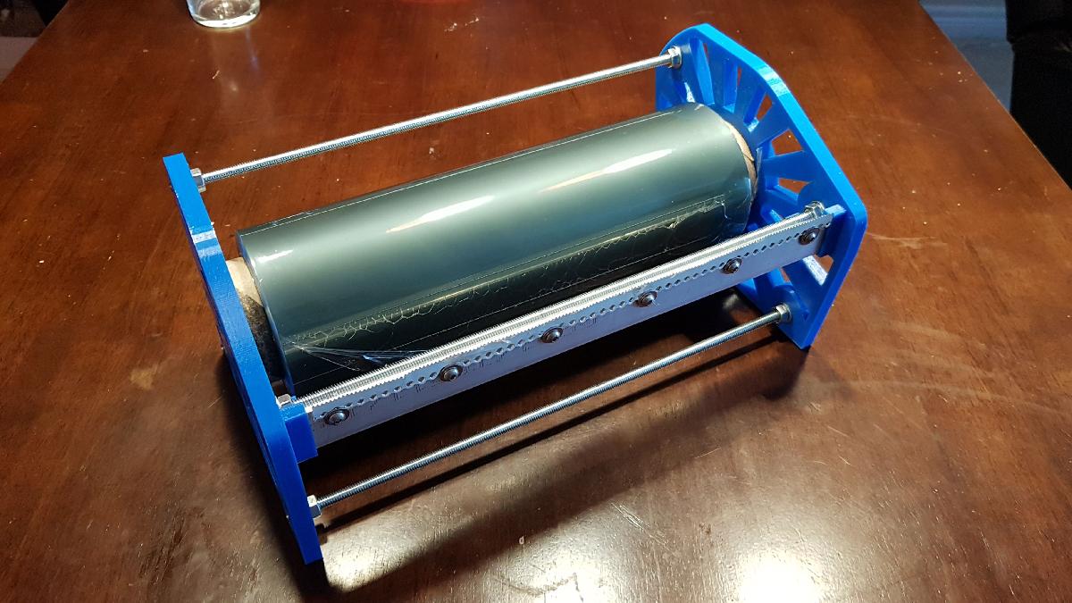 Suporte para rolo grande de filme plastico