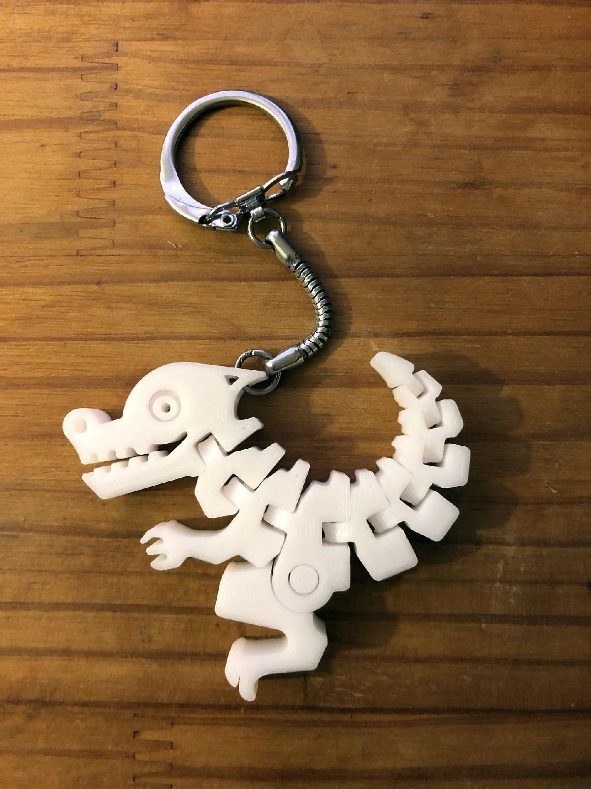 Chaveiro Flex Dino