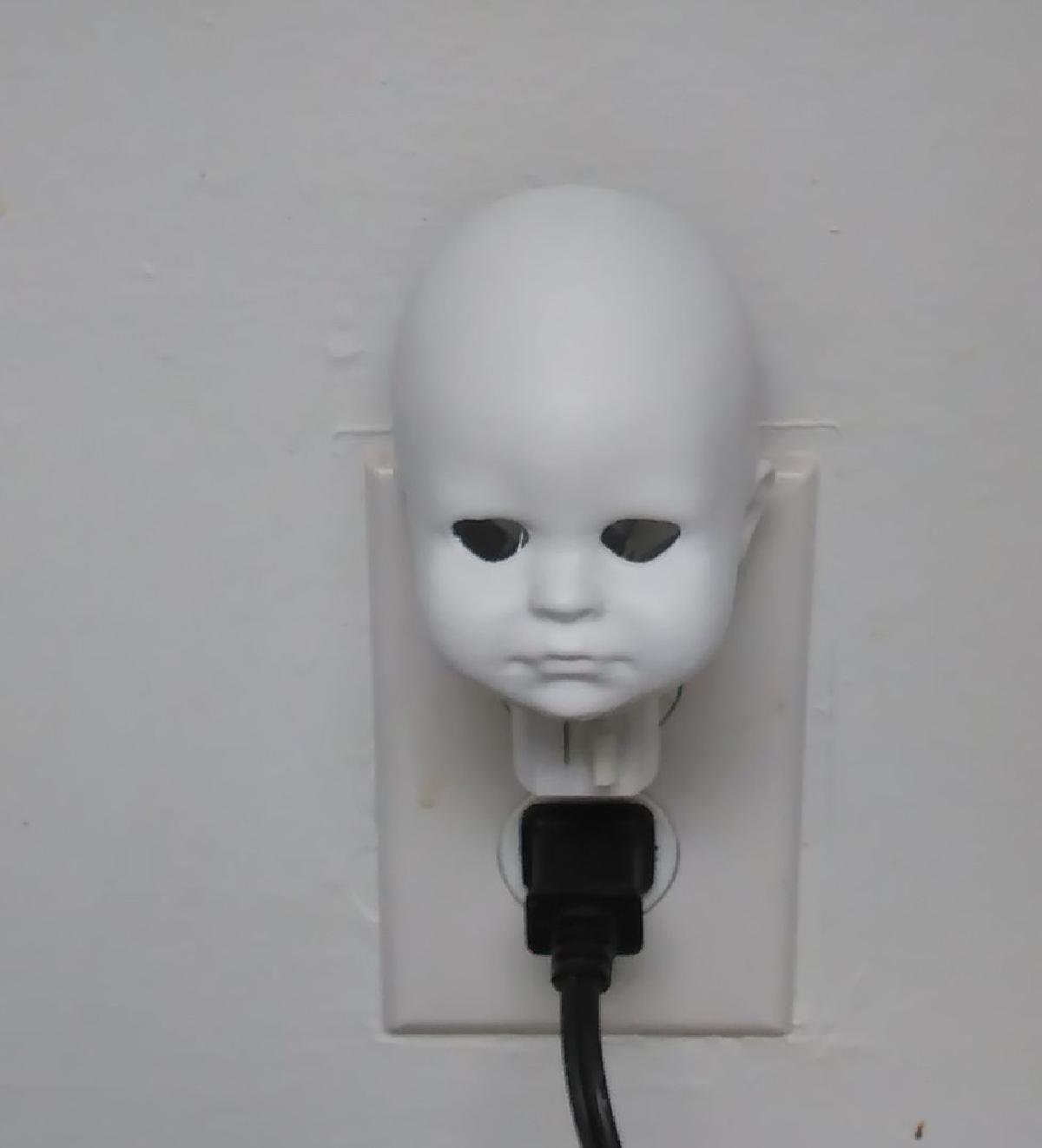Luz noturna da cabeça da boneca