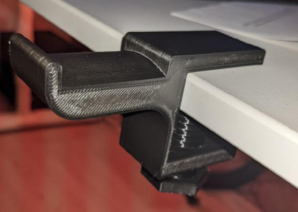 Suporte para fone de ouvido com parafuso