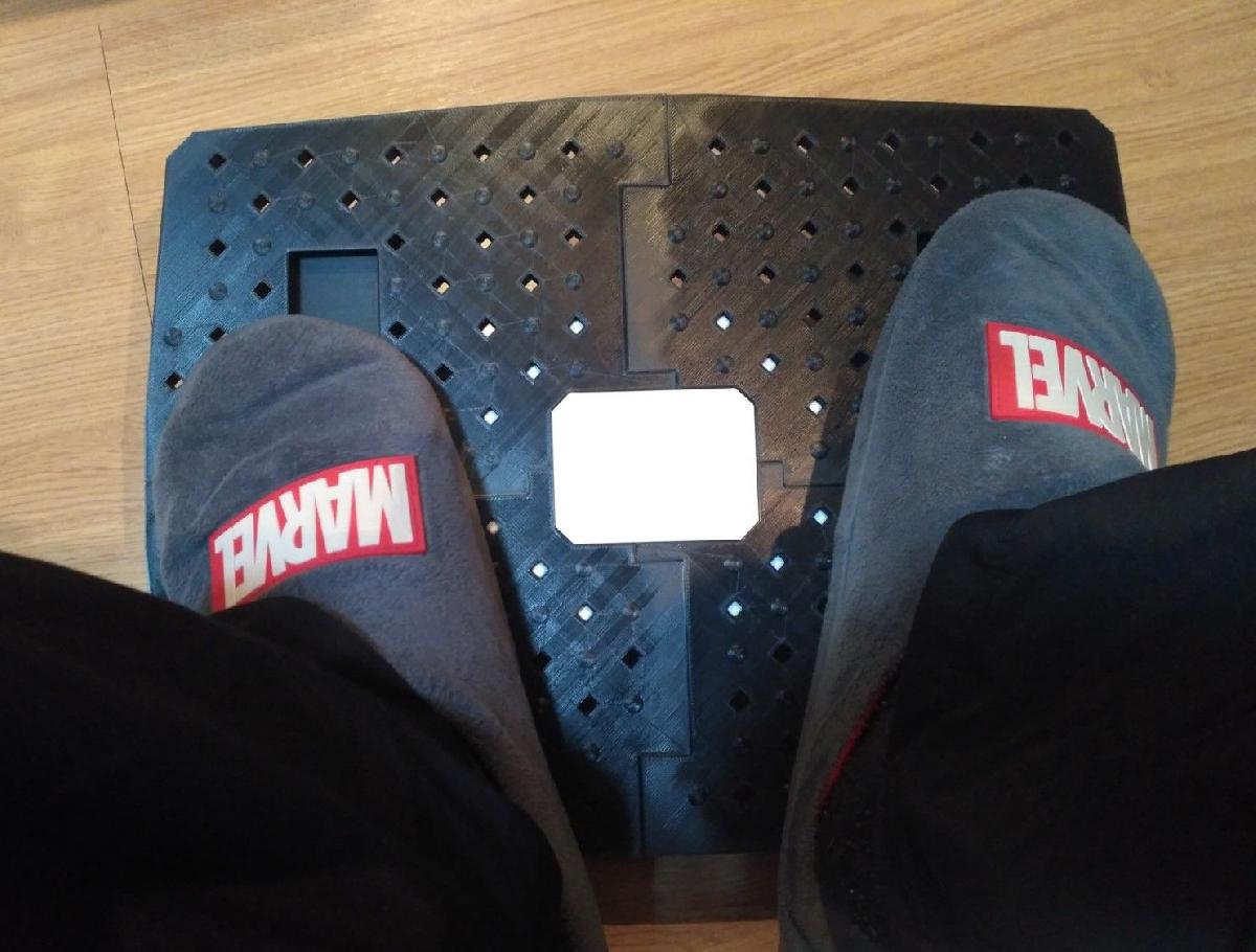 Apoio para os pés ajustável