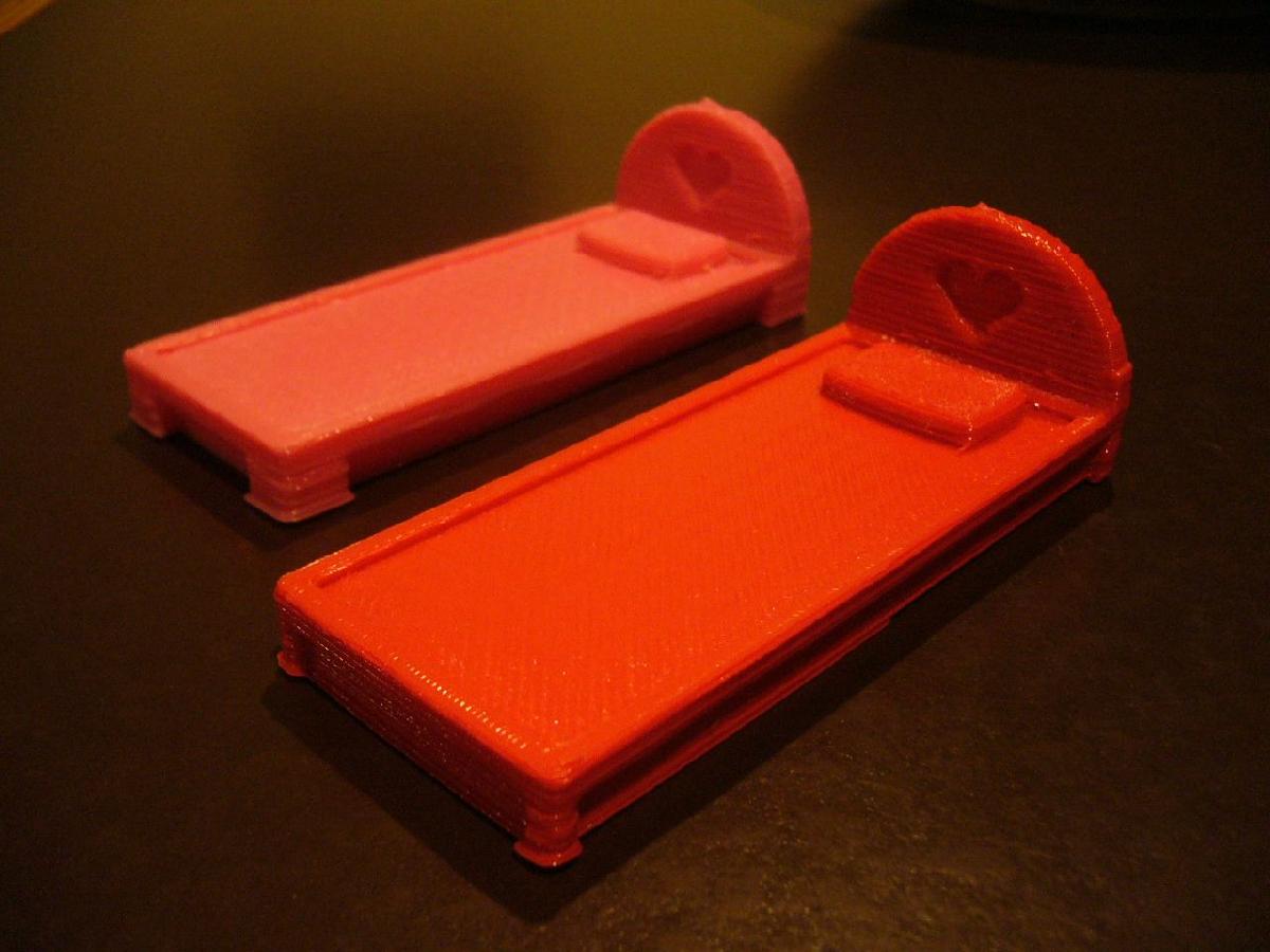 Cama de bonecas