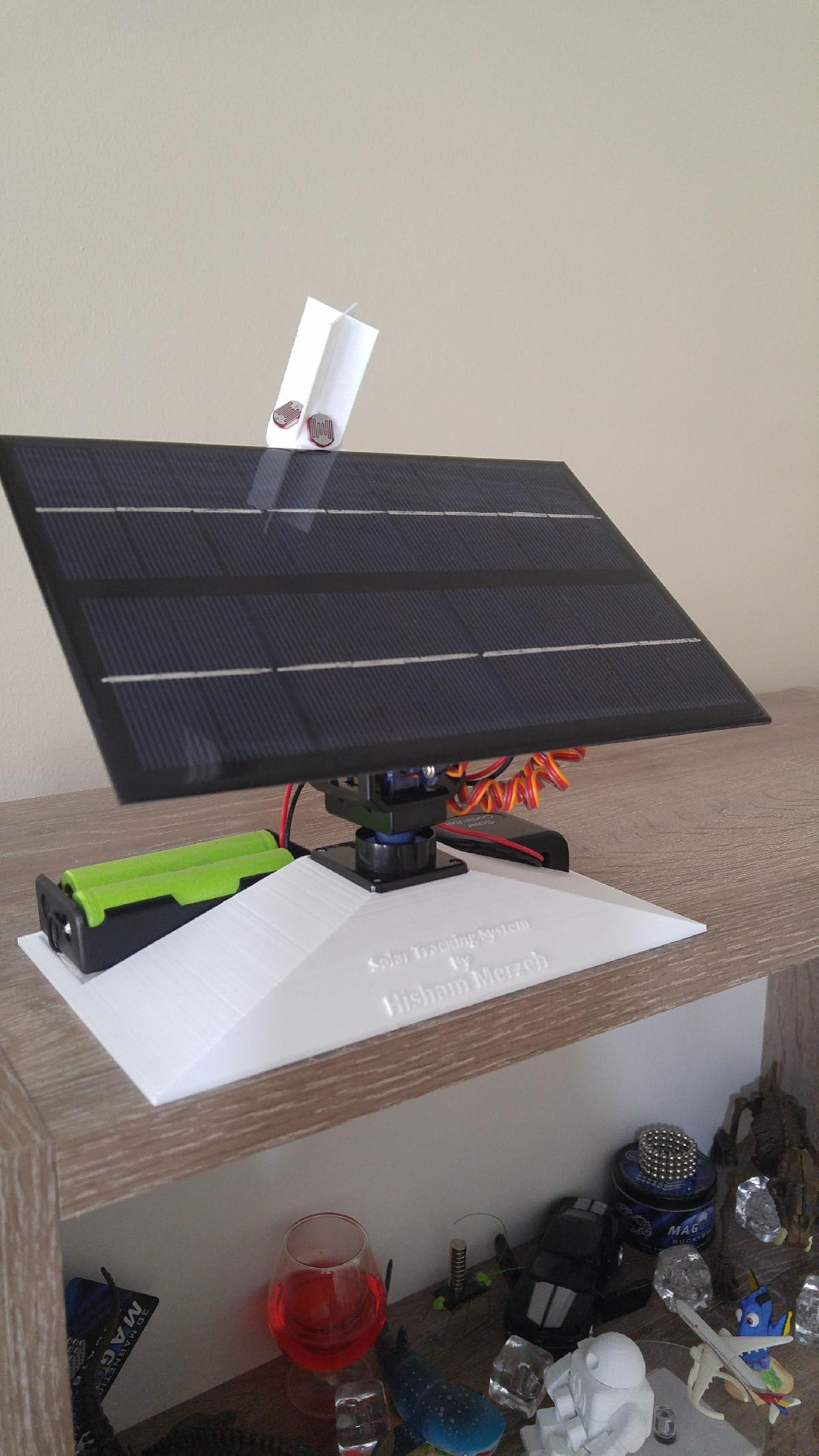 Sistema de Rastreamento Solar & carregador móvel