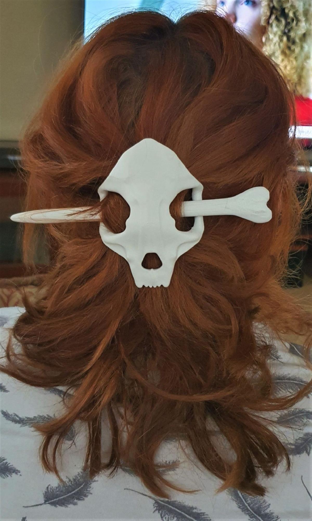 Alfinete de cabelo do crânio