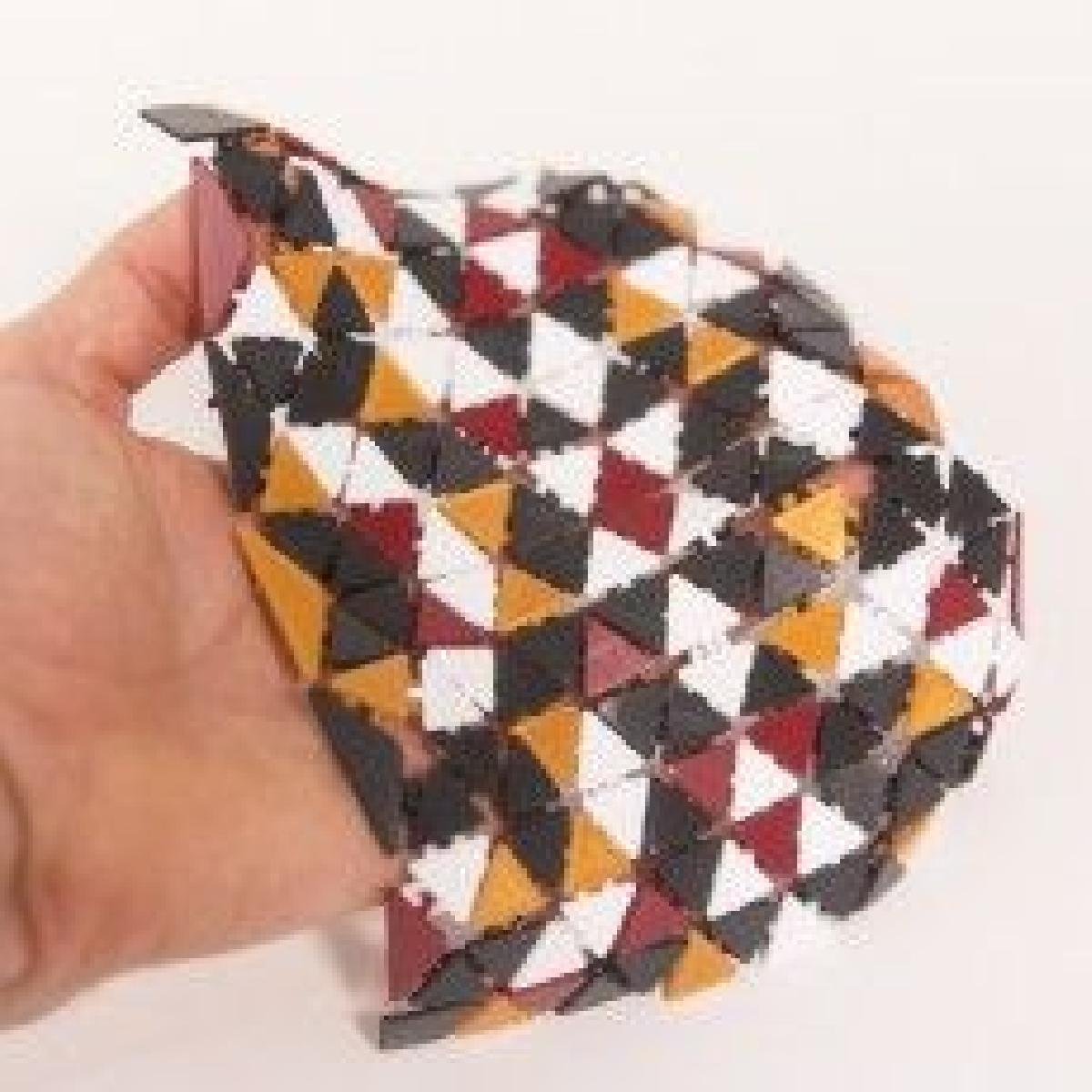 Tecido de malha triangular