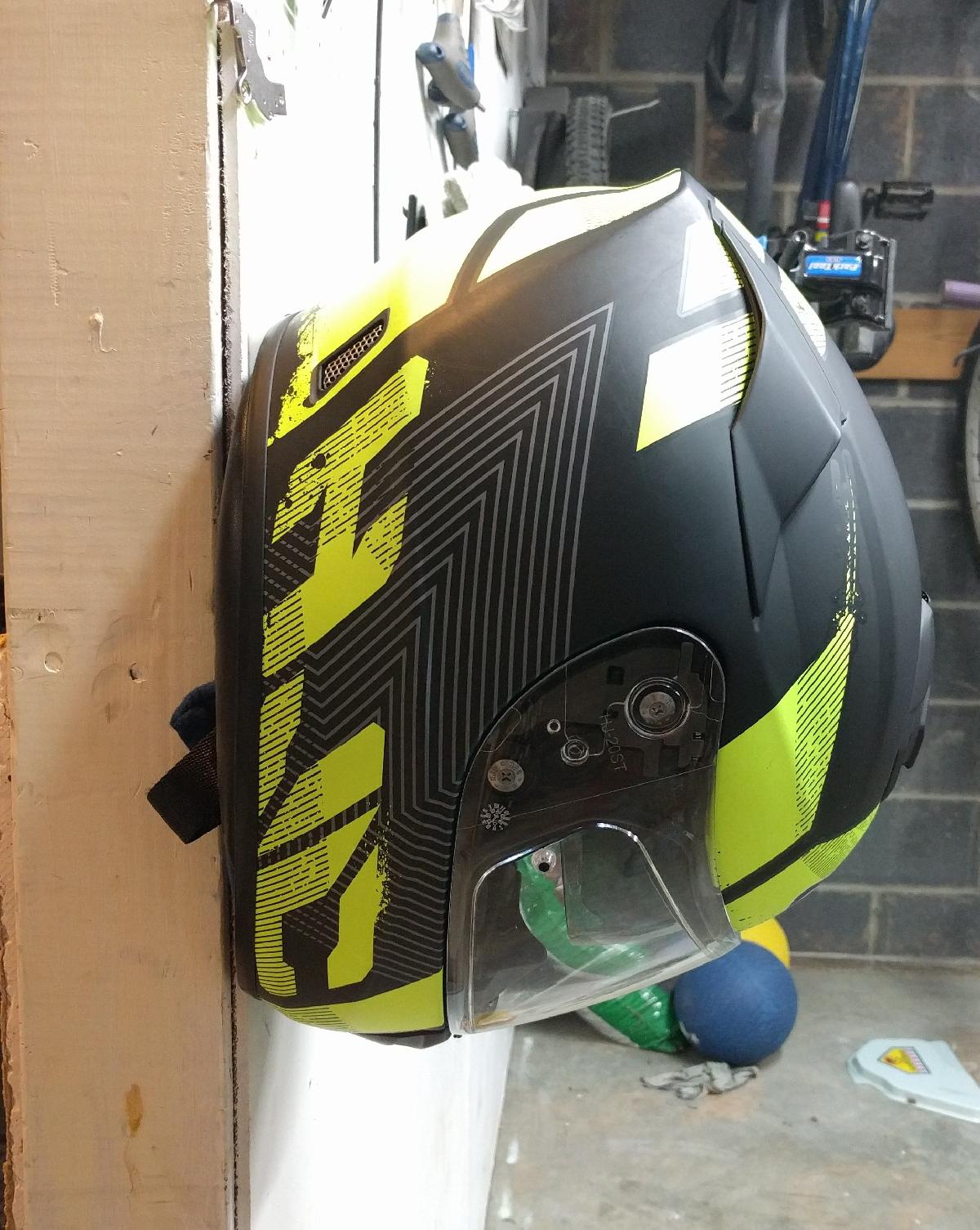 Suporte de capacete de motocicleta montado na parede